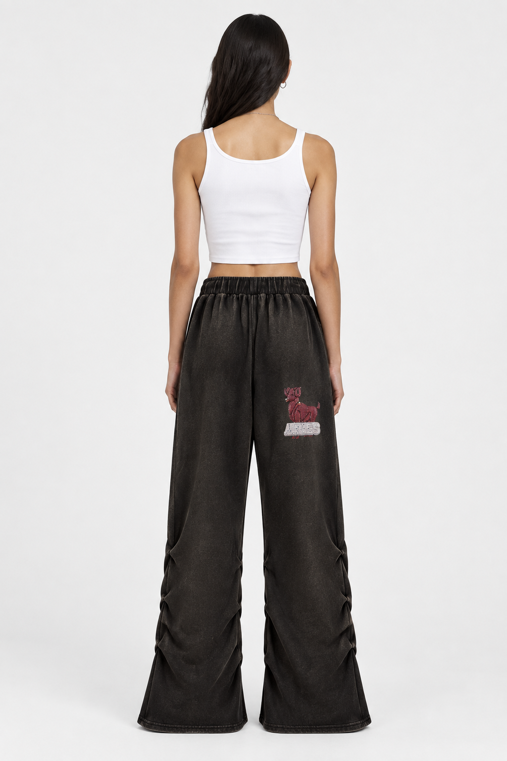 Female model back view of Aries ruched sweatpants