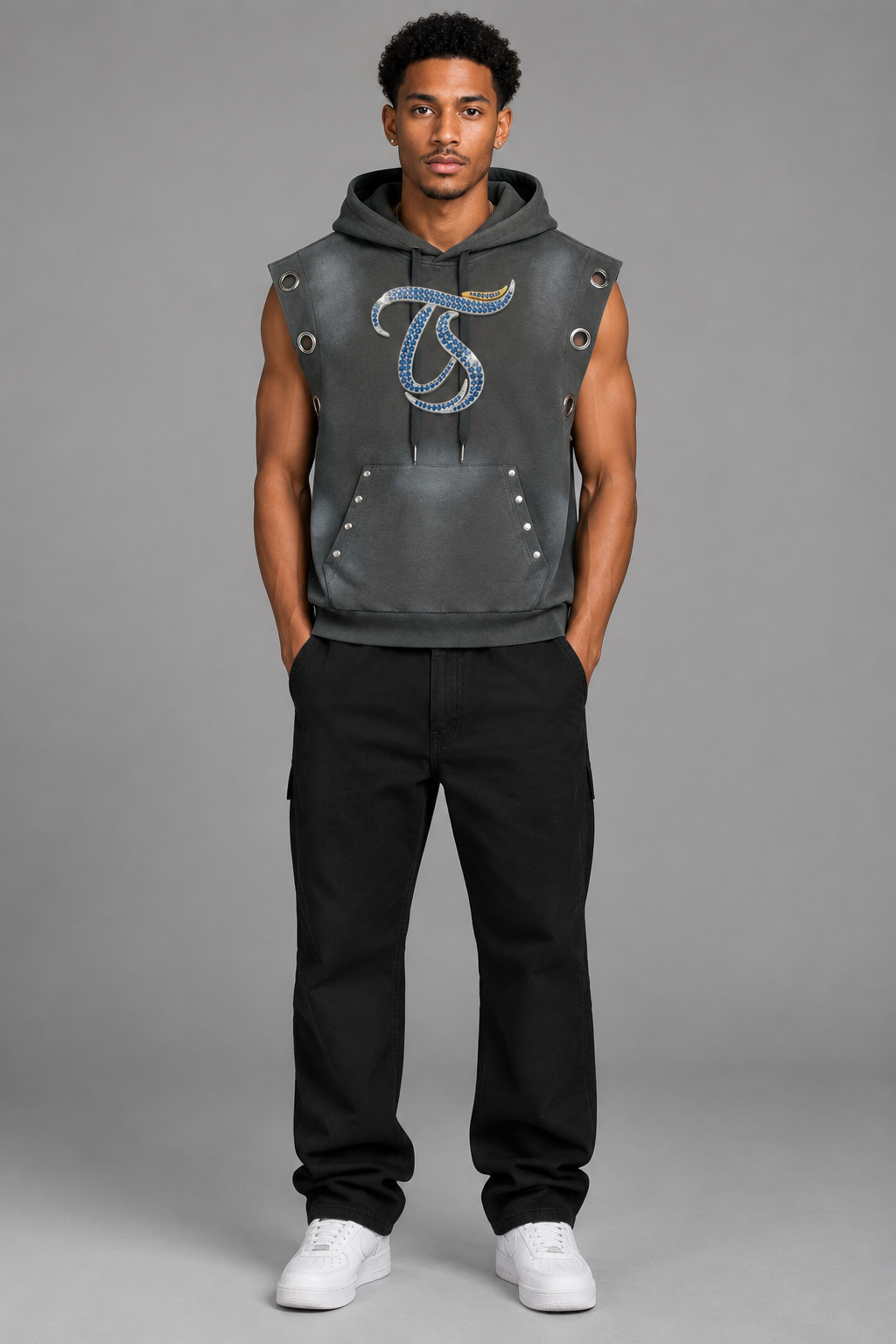 Model wearing gray Capricorn sun fade sleeveless hoodie, front chest mark; illustrative styling photo