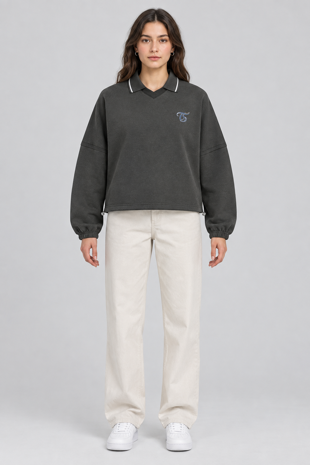 Female model wearing Taurus boxy collared detachable sweatshirt, front styling view; illustrative image