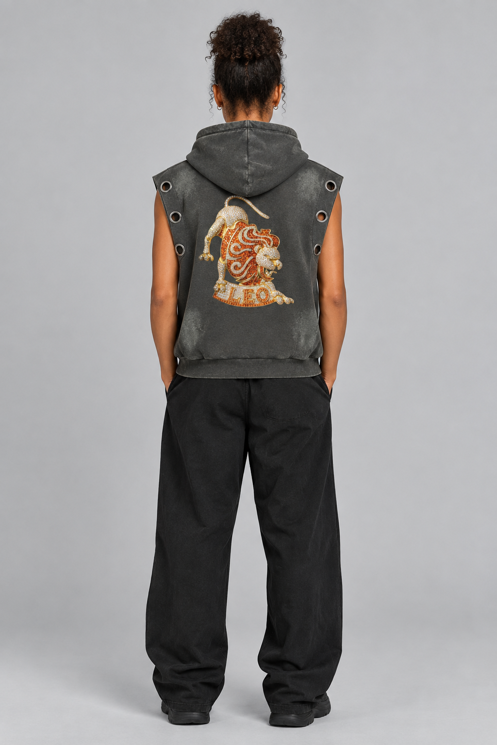 Female model wearing gray Leo sun fade sleeveless hoodie, back lion design; illustrative styling photo